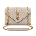 Saint Laurent YSL Envelope small chain crossbody bag in cream off-white chevron quilted suede with oversized gold YSL monogram and gold curb chain strap with leather shoulder pad