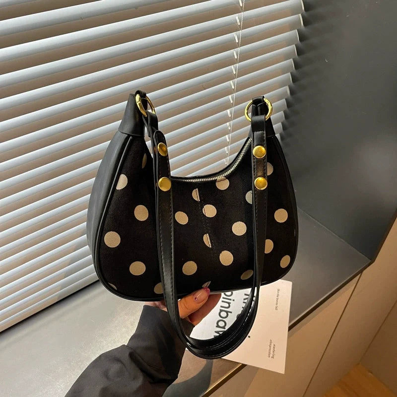 Black Glossy Polka Dot Crescent Hobo Underarm Bag with Gold Tone Rivets Zip Top and Detachable Adjustable Shoulder Strap