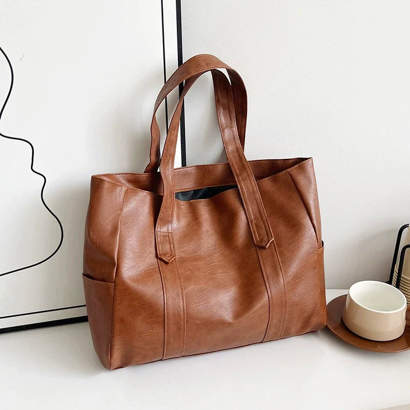 Large Vintage Cognac Brown Wax Leather Tote Bag with Wide Flat Shoulder Straps and Side Slip Pockets
